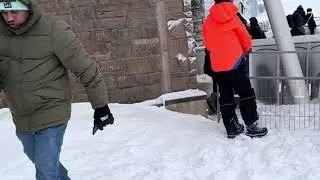 making snow angel near horseshoe falls