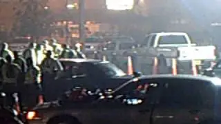 Guy drives through DUI checkpoint with 12 pack of Corona