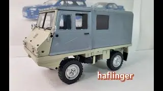 Распаковка и обзор литой военной внедорожной машины 4x4 Schuco Steyr Puch Haflinger Edition 1:18