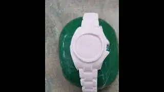 step by step of our Rolex rainbow Daytona watch cake.