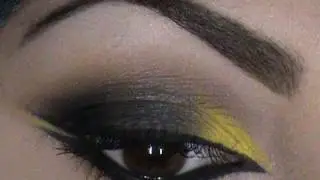 makeup tutorial  a gray smokey eye with a hint of yellow