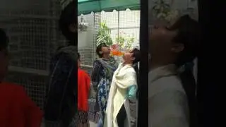 Searl Pakistan vitamin water school activity teachers without hands drinking competition