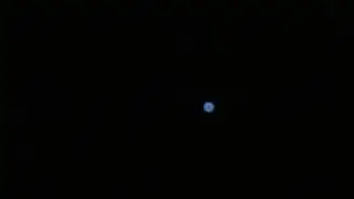 Blue orb floating in the nights sky... ufo? aliens? or satellite?