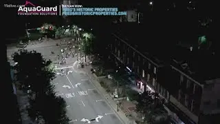 Protesters amass in front of UGA arch in Athens
