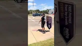 Guy is enthusiastically spinning a sign! #shorts