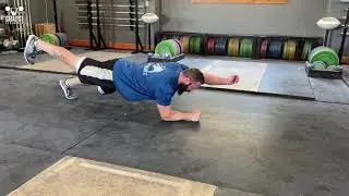 Plank March | Olympic Weightlifting Exercise Library