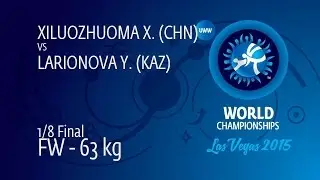 1/8 FW - 63 kg: Y. LARIONOVA (KAZ) df. X. XILUOZHUOMA (CHN), 10-1