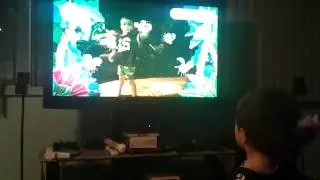 Jayden playing the playstation move