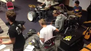 Peter Gill's Cheltenham Rock School 2014 rehearsing Come Together