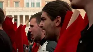 Thousands of Greeks march against proposed 13-hour workday | REUTERS