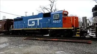 CSX CN NS and GTW lead a manifest south through Elgin IL