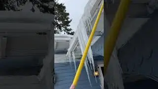 Knocking down huge icicles off my roof #shorts #winter #ice #snow #asmr ￼