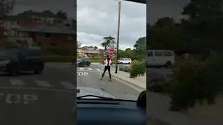 Kook of the day  guy skiing on streets with rollerblades red white black jacket