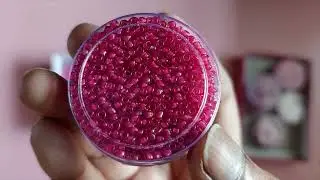 Unboxing from Amazon craft ball chain silver and gold, pink and purple color glass seed beads.