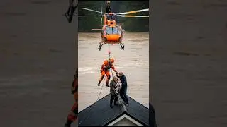 Helicopter Airlifts Baby & Grandparents From Rooftop as Floodwaters Rise #shorts #viral #flood #fyp