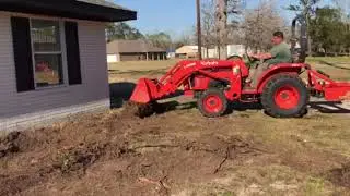 Kubota L2501 HST - digging up root balls