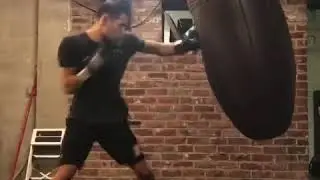 Charlie Sheehy working on the Large Acorn Punching Bag by Grodex