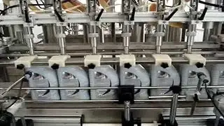 car oil filling capping labeling cartoning line fully automatic lub filler line سيارة ملء خط النفط