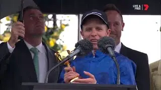 Kerrin McEvoy lifts the Lexus Melbourne Cup