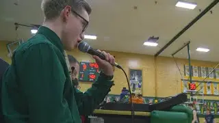 Kearns High School student overcomes challenges to become voice of the Cougars hoops team