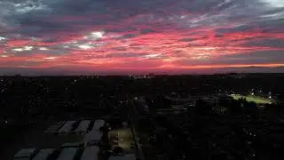Pink Sunset Skyline: Breathtaking 4K Cityscape and Nature Afterglow Drone Footage