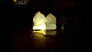 HATSAN 125 sniper vortex .22 [slow motion] shooting through two water jugs
