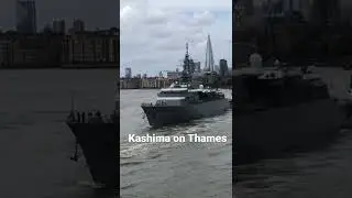 Japanese &lsquo;Kashima&rsquo; military ship sailing down stream on River Thames, London.