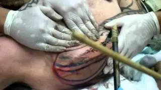 tapping at Soul Signature Tattoo Shop