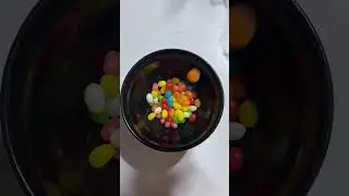 POURING COLORFUL JELLYBEANS IN A BOWL #asmr #colorful #jellybean #amazingsounds  #satisfying #viral