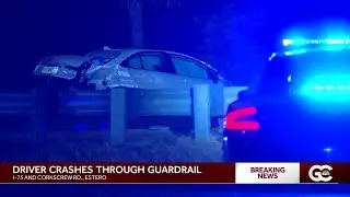 Car crashes through guard rail on I-75 and Corkscrew Rd
