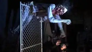 Thrashing Fence Zombie Animated Prop