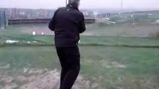 John Jacobs hitting a golf ball