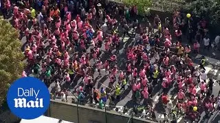 Aerial shots above Notting Hill Carnival parade dancers - Daily Mail