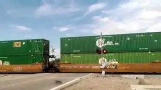 UP 7360 N w/ the Lathrop (ZLCLT) over Barrel Springs Rd.