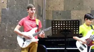 Bibliojazz: kids band playing jazz in a library