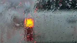 Rain on Window Glass 4K Stock Footage | No Copyright Nature Background Video