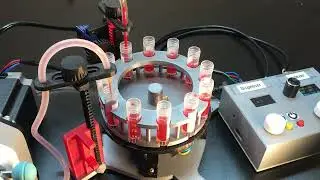 Dispenser, 2ml vials, rotary indexer. Two-channel peristaltic pump for continuous loop demonstration
