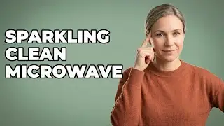What are the steps to steam clean a microwave interior?