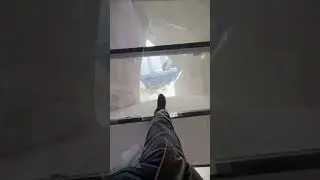 Walking Across The Lower Glass Floor At CN Tower Toronto Canada
