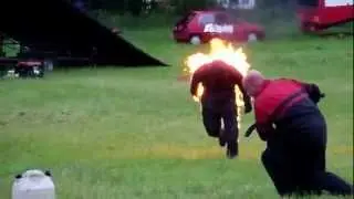 Stunt Man Driven into fire and doing a fire run.