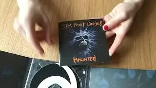 Six Feet Under - Haunted [Unboxing CD]