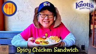 Spicy Chicken Sandwich with Coleslaw at Wilderness Dogs & Drinks: 2025 Knott's Peanuts Celebration