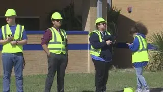Arnold High School students building a tiny home
