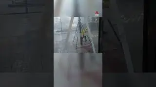 Hong Kong pedestrian struggles to walk as Typhoon Ragasa batters city