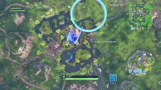 Fortnite fortbyte #4 accessible by skydiving through the rings above loot lake with the plasma trail