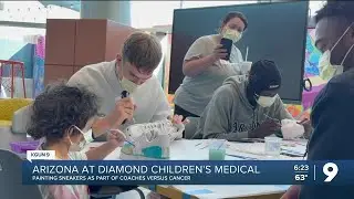 Arizona Basketball paints sneakers with kids at Diamond Children's Medical Center