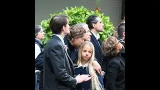A few days after her 14th birthday, Giulia Sarkozy in her father's arms as he leaves the