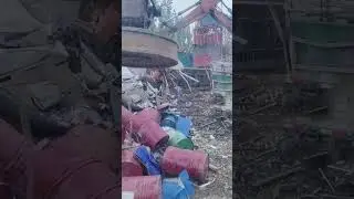 Excavator Claw Operation for Scrap Metal Handling