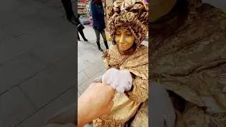 Fist bump real money for Gold Lady #trending #goldstatue #disney #disneybeast #disneystar #shorts