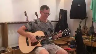Акустическая гитара Larrive Tommy Emmanuel в гитарном клубе